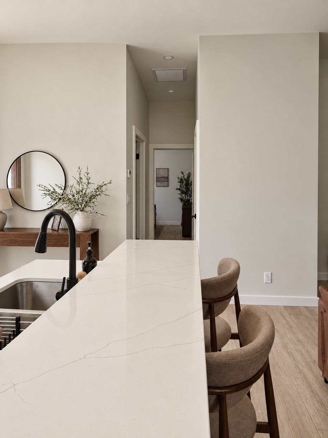 Quartz kitchen island looking down the hallway