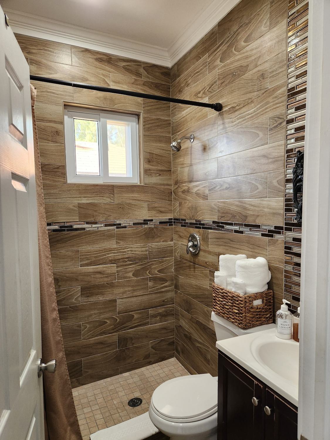 Bathroom with wood-look tile shower